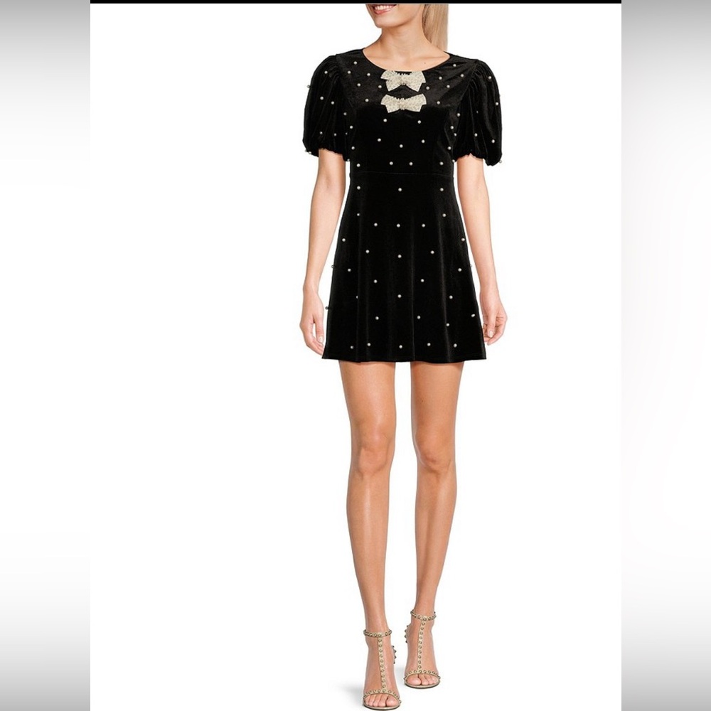 Elegant Black Mini Dress with Bow Detail